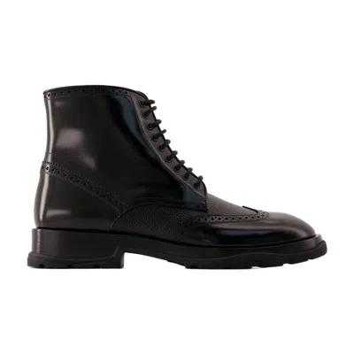 Alexander Mcqueen Laced Ankle Boots In Black