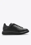 Alexander Mcqueen Black Sneakers With Logo Lettering On The Rear And Oversize Rubber Sole In Leather In Black