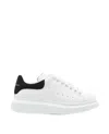 Alexander Mcqueen Oversized Sneakers In Leather With Contrasting Heel Tab In Black