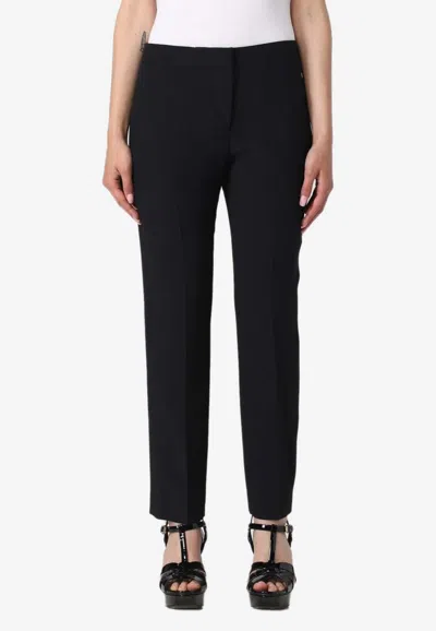 Alexander Mcqueen Pants Mcqueen Woman Color Black In Animal Print
