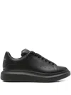 Alexander Mcqueen Men Black Sneakers With Logo Lettering On The Rear And Oversize Rubber Sole In Lea In Black