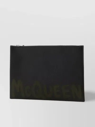 ALEXANDER MCQUEEN LEATHER POUCH WITH STRIKING GRAFFITI PRINT