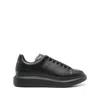 Alexander Mcqueen Black Sneakers With Logo Lettering On The Rear And Oversize Rubber Sole In Leather