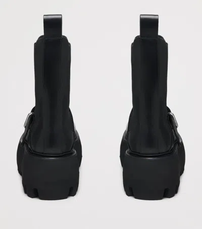 Alexander Mcqueen Leather Sofa Ankle Boots In Black