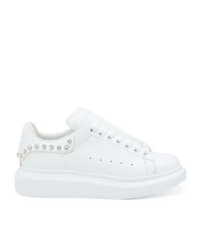 ALEXANDER MCQUEEN LEATHER STUDDED SPRINT RUNNER SNEAKERS