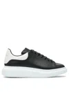 Alexander Mcqueen Black Low Top Sneakers With Chunky Sole And Contrasting Heel In Leather Man In Black