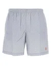 Alexander Mcqueen Embroidered Skull Swim Shorts In Light Blue