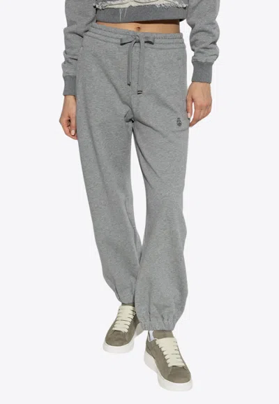 Alexander Mcqueen Logo Embroidered Track Pants In Gray