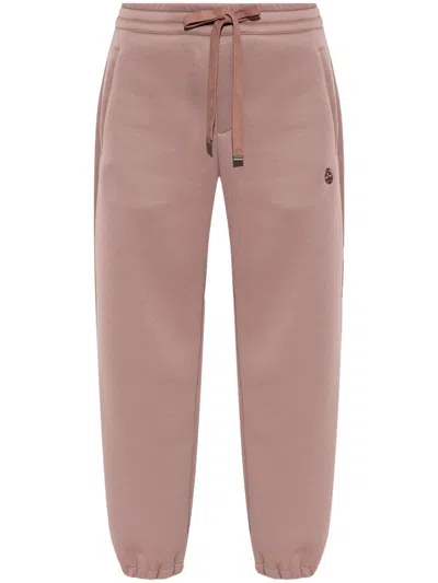 Alexander Mcqueen Embroidered -skull Track Pants In Pink