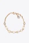 Alexander Mcqueen Logo Lettering Crystal Embellished Bracelet In Gold