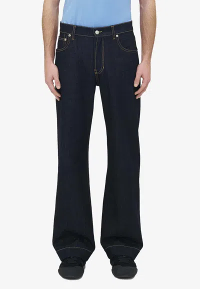 Alexander Mcqueen Logo Patch Wide-leg Jeans In Blue