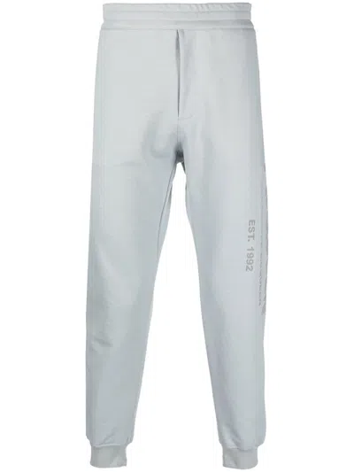 Alexander Mcqueen Logo-print Cotton Track Pants In Gray