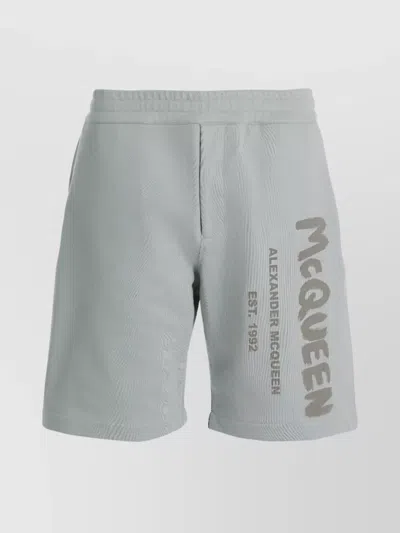 ALEXANDER MCQUEEN LOGO PRINT COTTON TRACK SHORTS