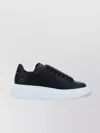 Alexander Mcqueen Women Black Low Top Sneakers With Logo Lettering On Tongue And Heel In Leather Wom In Black