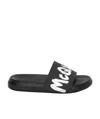 Alexander Mcqueen Graffiti Logo Rubber Slide Sandals In Black