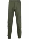 Alexander Mcqueen Logo Print Tapered Track Trousers