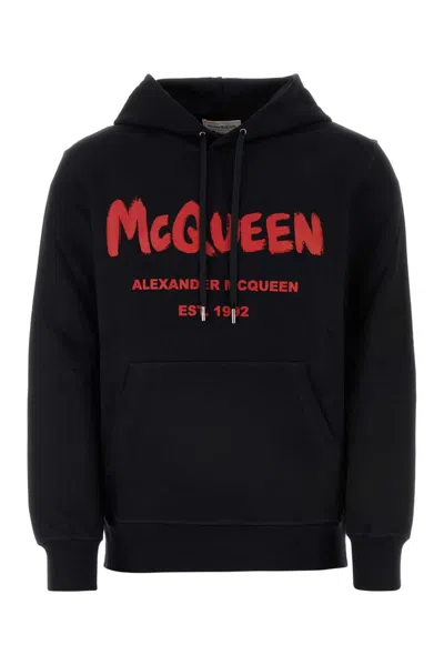 Alexander Mcqueen Logo Printed Drawstring Hoodie In Black