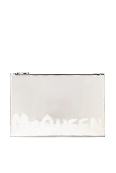 Alexander Mcqueen Logo Printed Zipped Clutch Bag In Gold