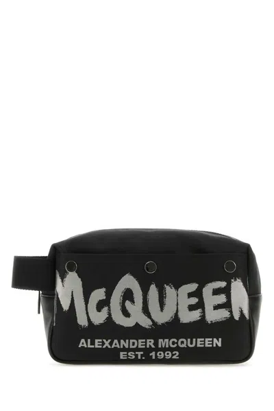 Alexander Mcqueen Logo Printed Zipped Toiletry Bag In Black
