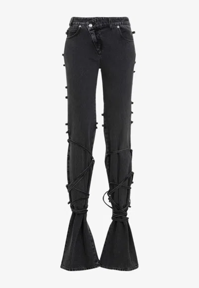 ALEXANDER MCQUEEN LOW-RISE TIED JEANS