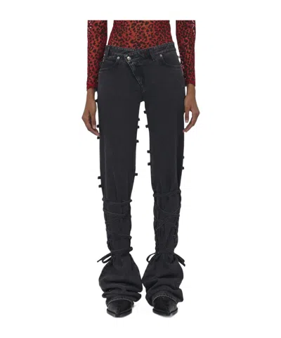 ALEXANDER MCQUEEN ALEXANDER MCQUEEN LOW-RISE TIED JEANS