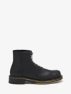 Alexander Mcqueen Chunky Sole Round Toe Studded Ankle Boots In Black
