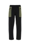 Alexander Mcqueen Contrast-pocket Cotton Track Pants In Black
