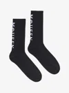 Alexander Mcqueen Logo-embellished Ribbed Socks In Black