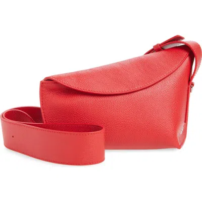 Alexander Mcqueen Mcqueen T-bar Sling Asymmetric Leather Crossbody Bag In Red