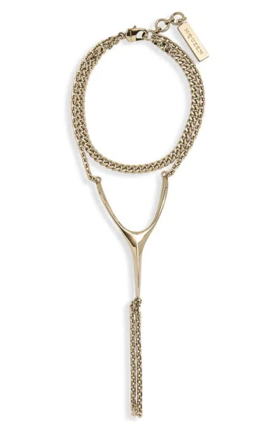 Alexander Mcqueen Mcqueen Wishbone Hand Chain Bracelet In Gold