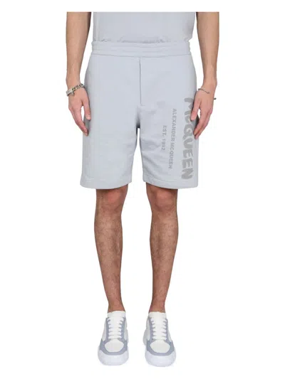 Alexander Mcqueen Men's Bermuda Shorts With Graffiti Logo Print In Azure