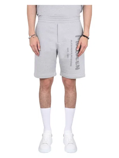 ALEXANDER MCQUEEN MEN'S BERMUDA SHORTS WITH GRAFFITI LOGO PRINT