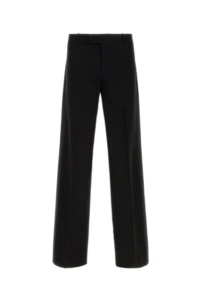 Alexander Mcqueen Wide Leg Wool Trousers With Front And Back Pockets In Black