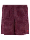 ALEXANDER MCQUEEN MEN'S BLUE 'SKULL DOTS' SWIM SHORTS FOR SS24