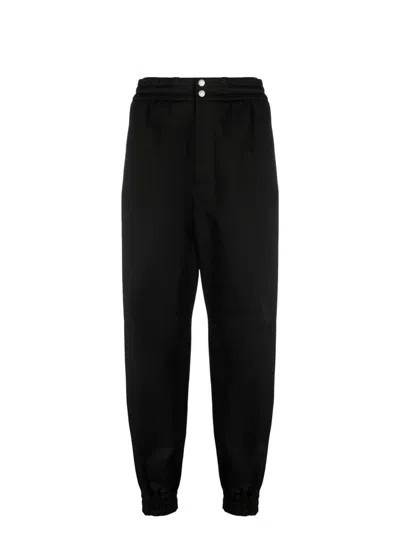 Alexander Mcqueen Denim Pant With Elastic Cuffs And Waist In Brown
