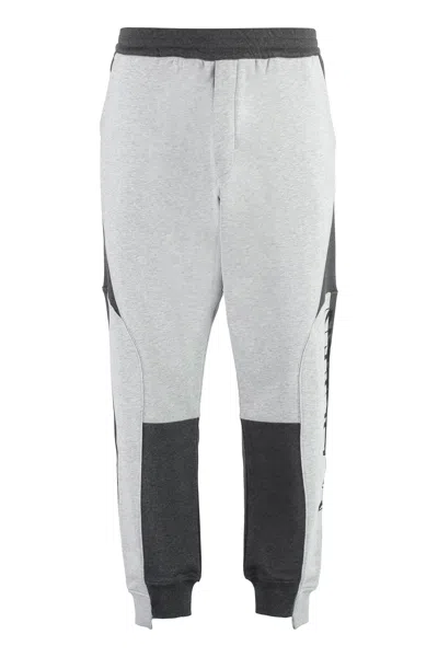 Alexander Mcqueen Logo Printed Colourblock Track Pants In Grey