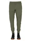 Alexander Mcqueen Jogging Pants With Graffiti Logo In Brown