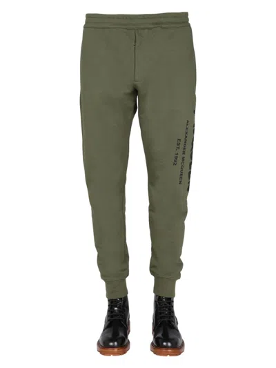 ALEXANDER MCQUEEN MEN'S JOGGING PANTS WITH GRAFFITI LOGO