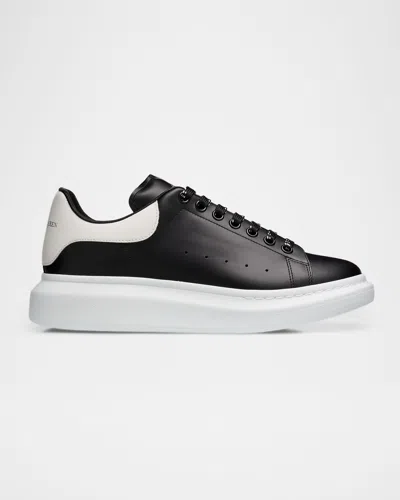 Alexander Mcqueen Black Low Top Sneakers With Logo Lettering On The Tongue In Leather Man