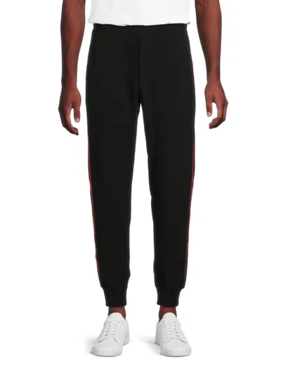 Alexander Mcqueen Logo Tape Track Pants In Black