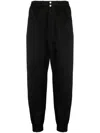 Alexander Mcqueen Men Printed Trousers In Black
