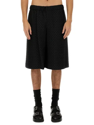 Alexander Mcqueen Men Skull Jacquard Pattern Shorts In Black