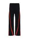Alexander Mcqueen Elastic Waistband Monogram Detailed Trousers In Black