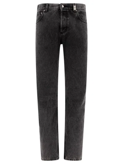 Alexander Mcqueen Metal Plate Jeans In Black