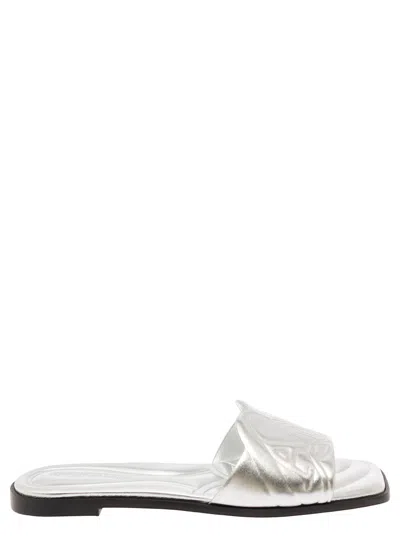 Alexander Mcqueen Metallic Flat Sandals With Embossed Motif In Metallic Leather Woman In Silver