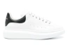 Alexander Mcqueen Minimalist White Leather Sneakers With Contrasting Heel Tab In White