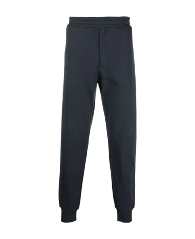 Alexander Mcqueen Motif-print Cotton Joggers In Black