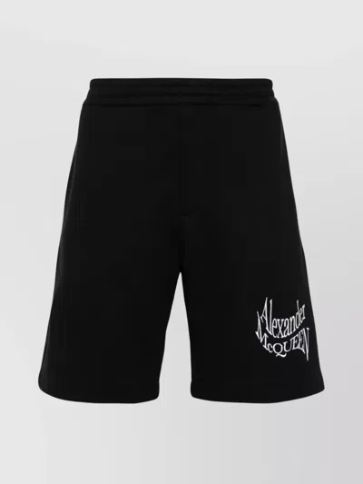 ALEXANDER MCQUEEN ORGANIC COTTON KNEE-LENGTH SHORTS WITH DISTORTED LOGO
