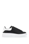 Alexander Mcqueen Leather Exaggerated-sole Sneakers In Black