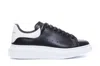 Alexander Mcqueen Men Low-top Leather Sneakers In Black